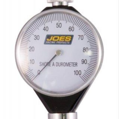 Precision dial durometer for measuring rubber hardness in racing applications.