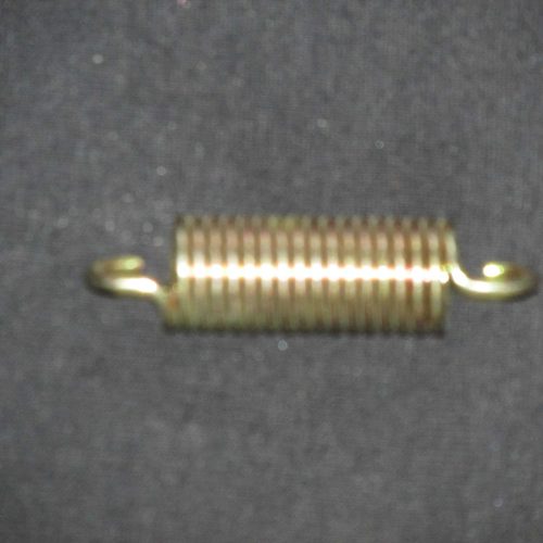 High-quality metallic coil spring for QRC Karts, ensuring durability and reliable performance.
