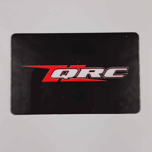 QRC Karts logo on black background, racing brand branding.